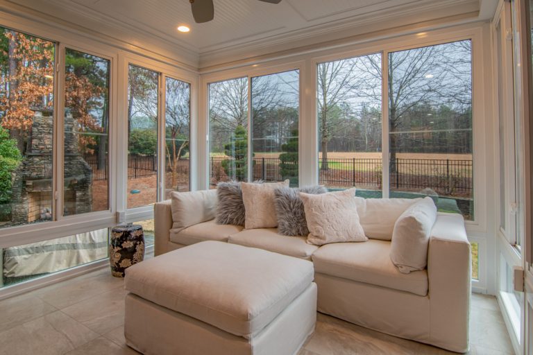 white-couch-near-glass-windows-3773582